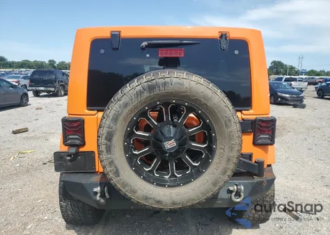 2012 Jeep Wrangler Unlimited Sahara из США, поврежденный, VIN 1C4BJWEG2CL160902